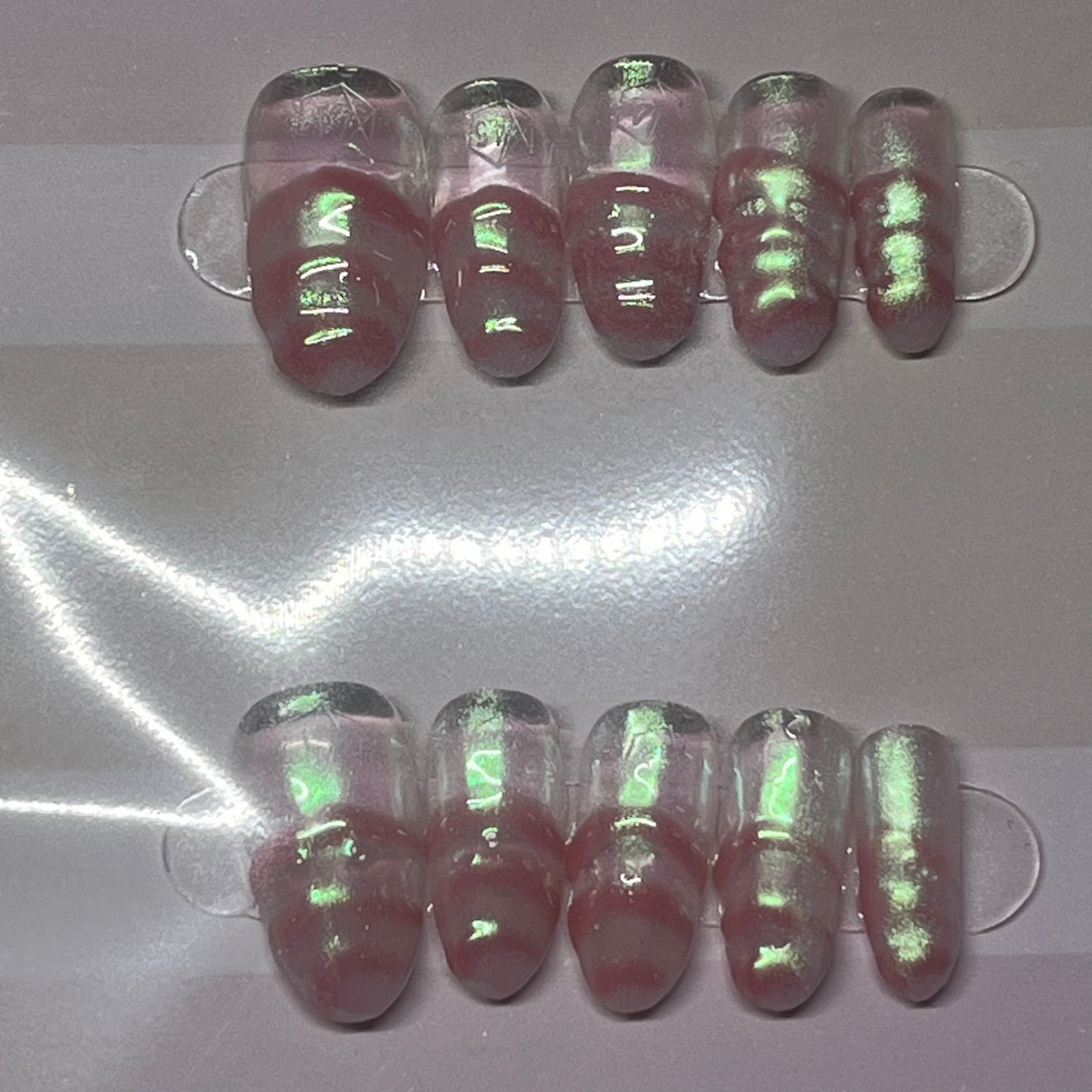 Iridescent pink clear chrome nails