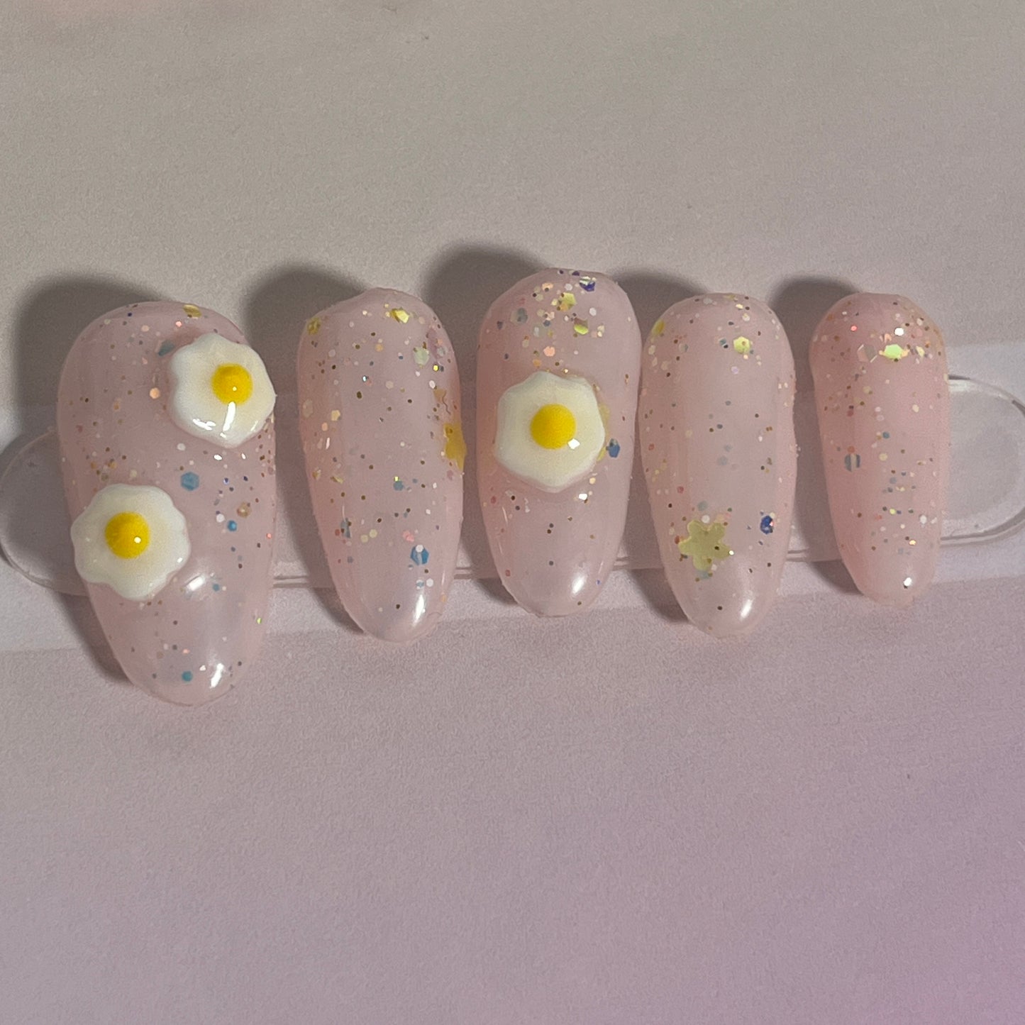 Pink Glitter Egg Nails