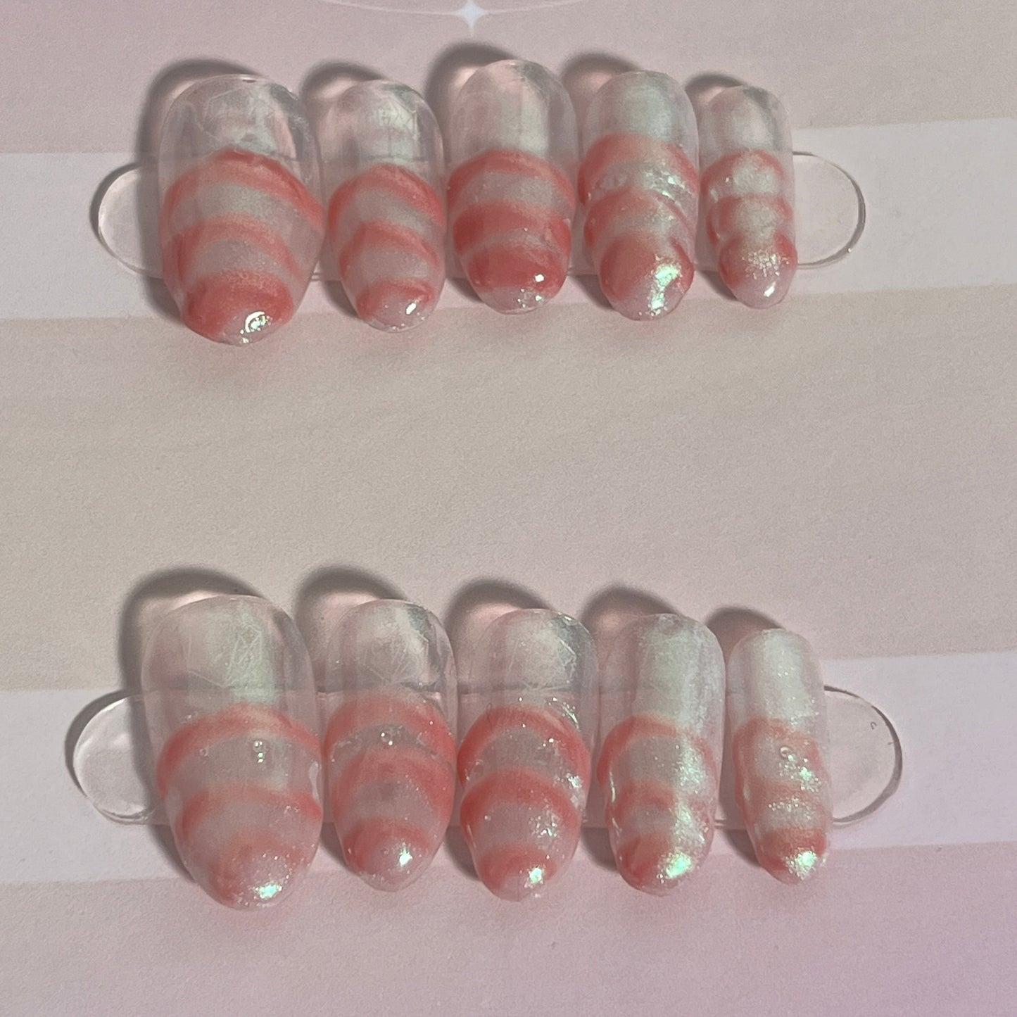 Iridescent pink clear chrome nails