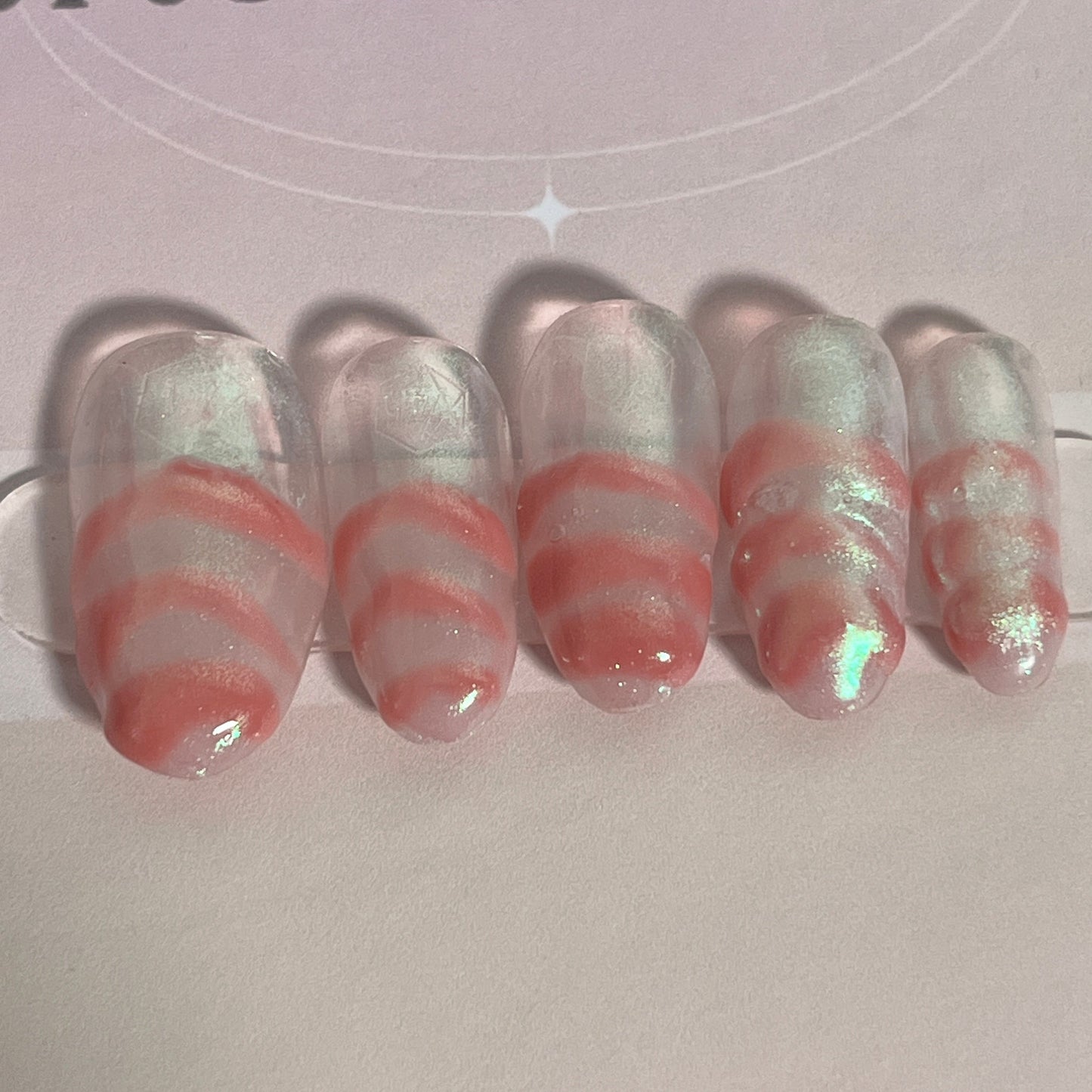 Iridescent pink clear chrome nails