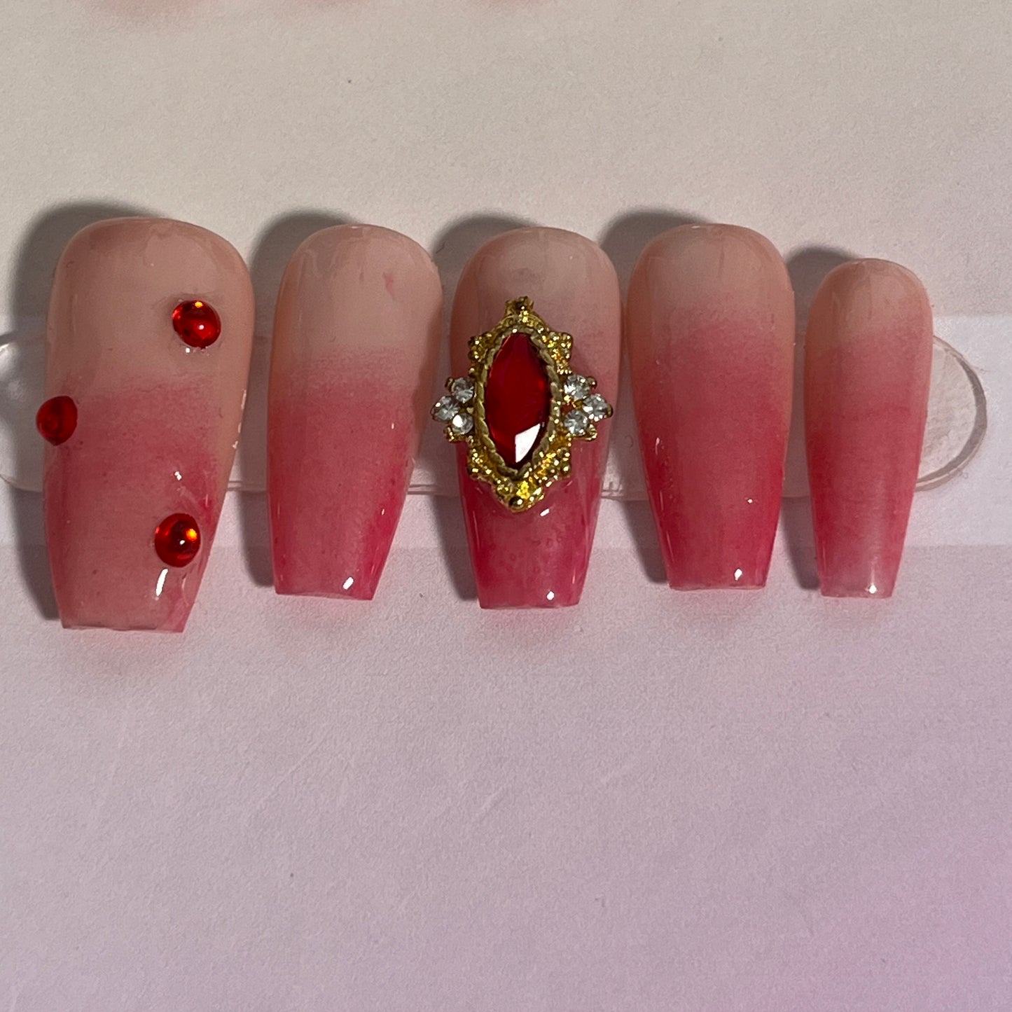 Peach Red Gem Nails